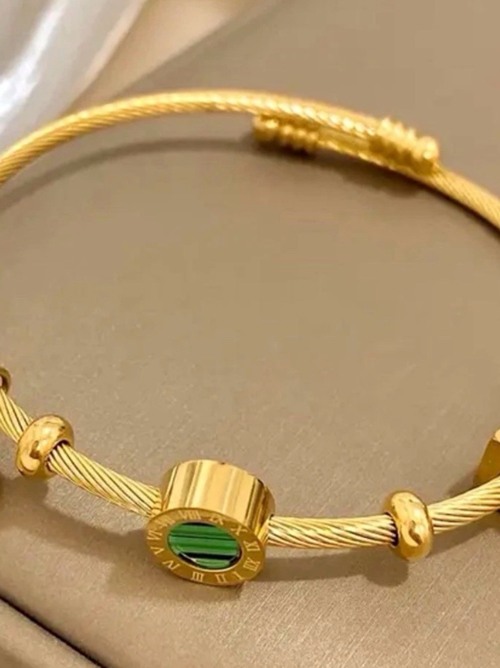 Gold-Tone Cable Bracelet with Green Accent